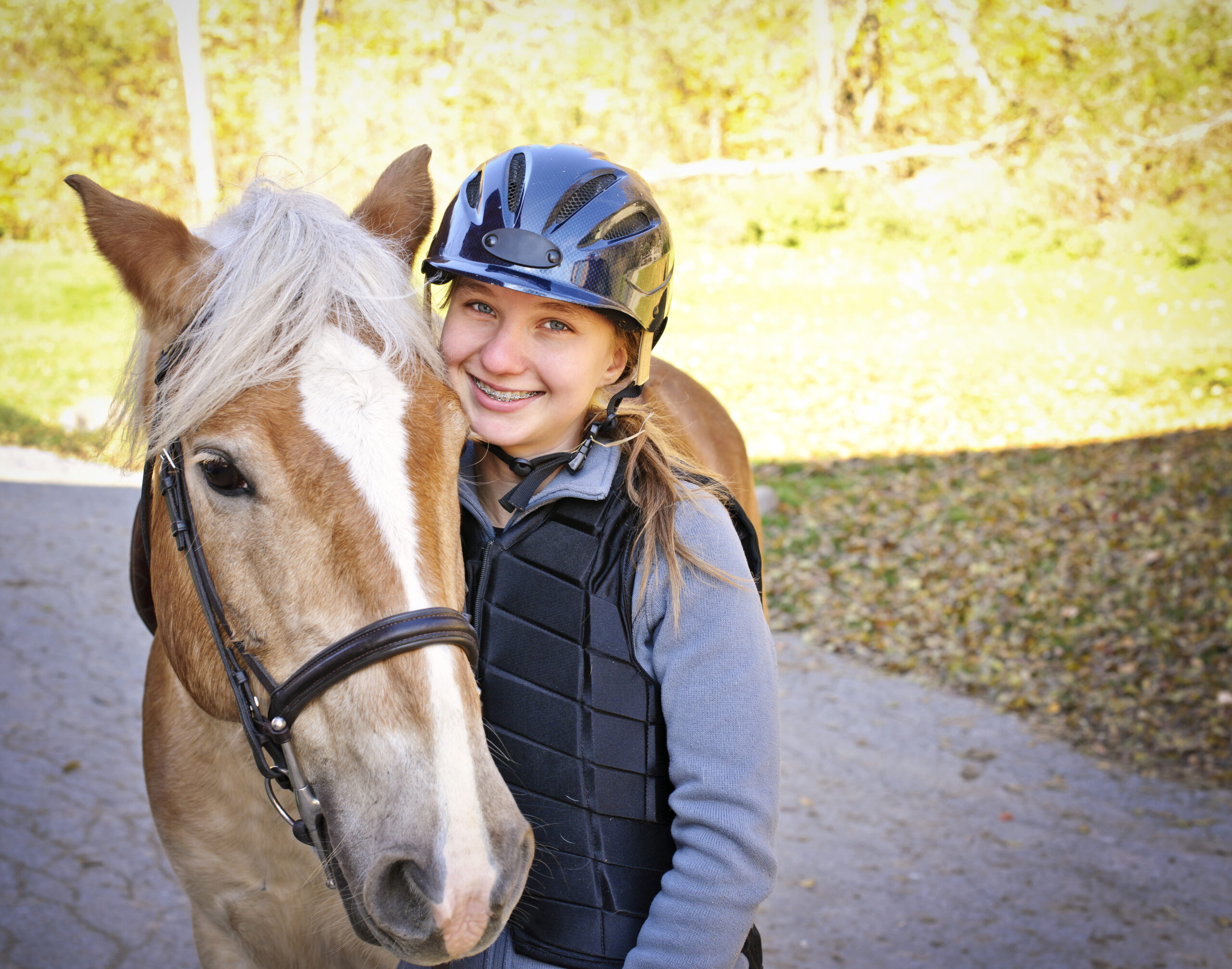 Portrait,Of,Teenage,Girl,With,Horse,Outdoors,On,Sunny,Day